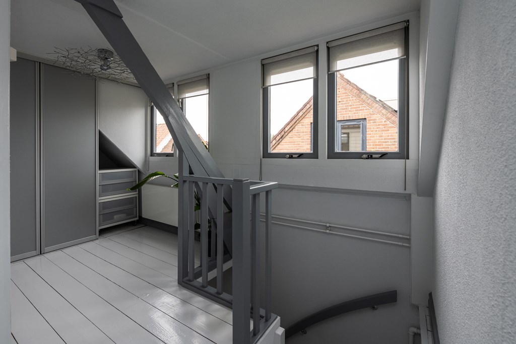 Spui 64, Strijen